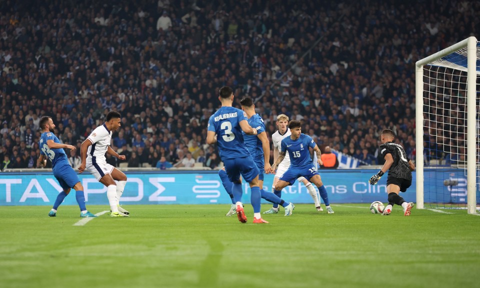 soccer players on a field with one wearing the number 3