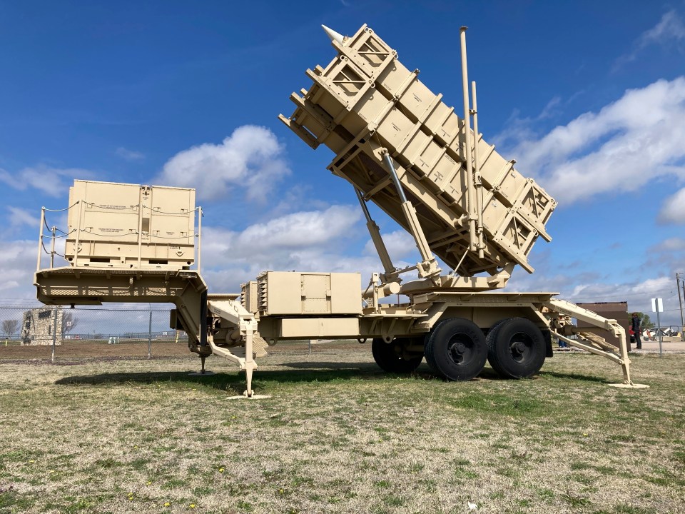 a large military vehicle with a rocket on top of it