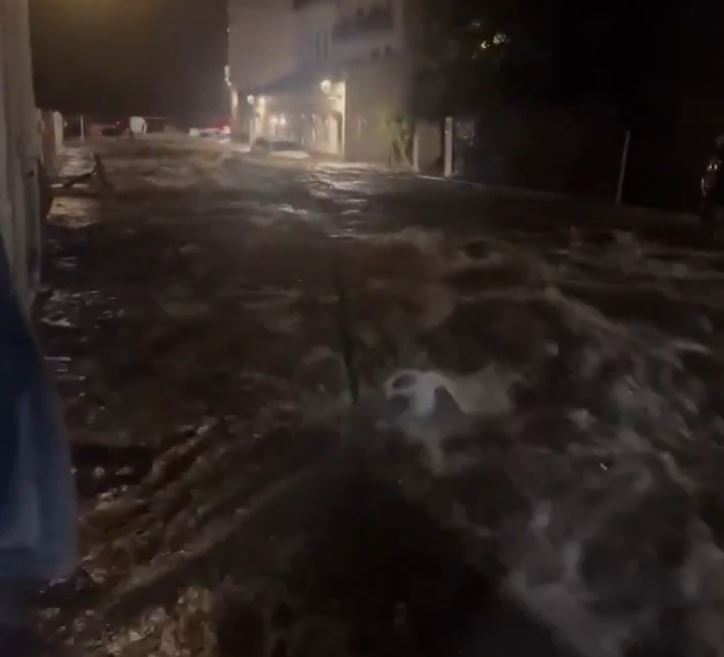 Footage captured the raging river pouring down streets