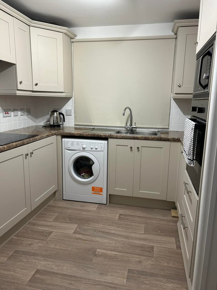 Emma Caley went viral on Facebook when she shared the results of her budget-friendly kitchen transformation, pictured