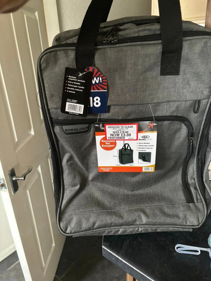 a gray bag with a tag that says 18 on it