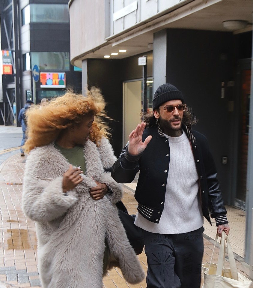 Despite the weather the pair stopped for fans outside