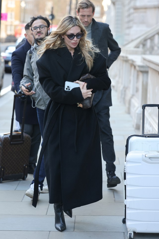 Abbey Clancy reveals the winter WAG look