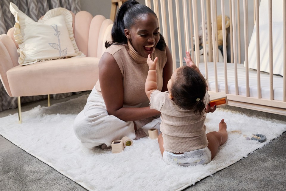 Oti and her daughter, over one year on from the traumatic birth