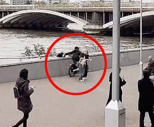 CCTV captures the moment a thief swipes a phone from a TikToker by the River Thames