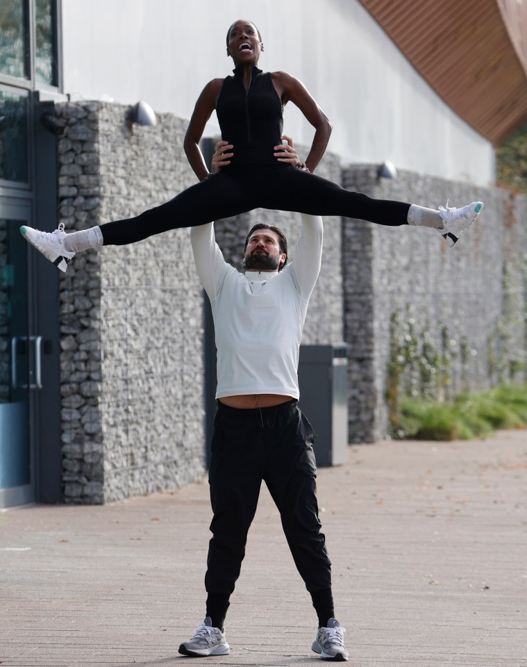 Dan proved his muscle power by lifting her over his head