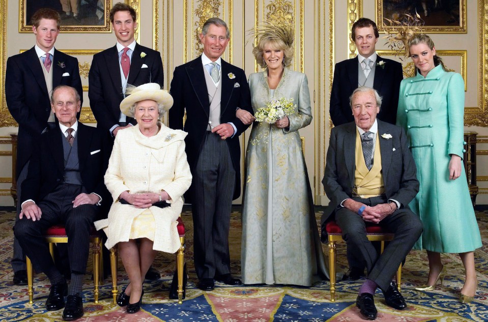 a group of people posing for a picture including the queen