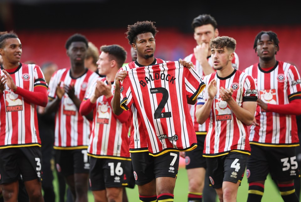 Sheffield United players held up a shirt to Baldock in a touching tribute