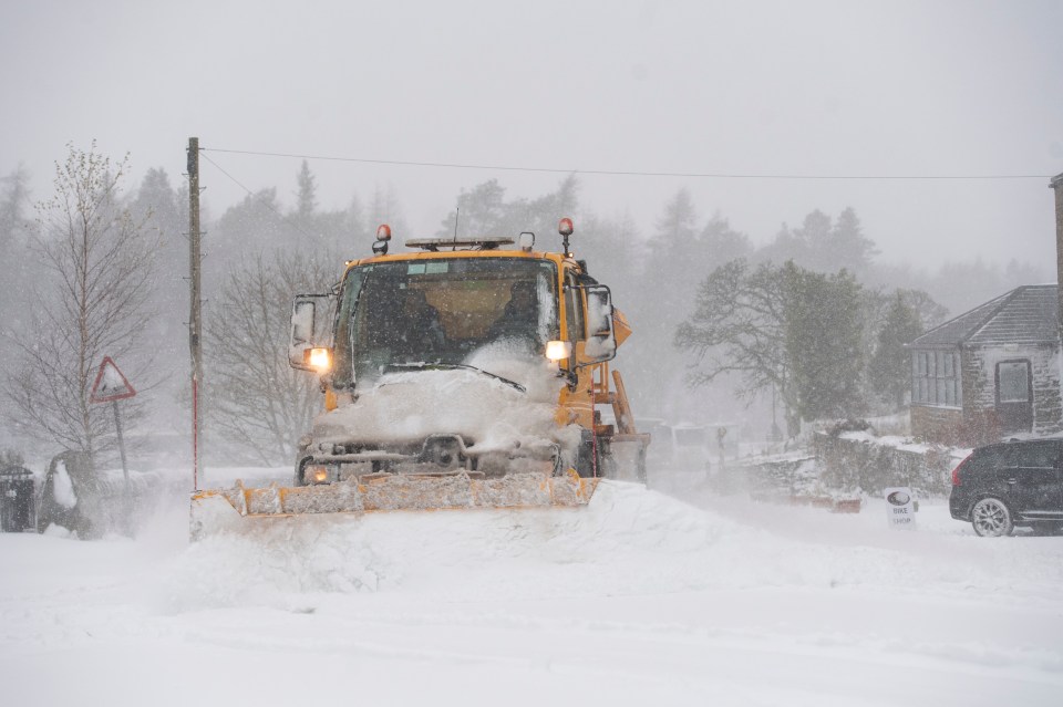 A snowplows battles against the strong winds and heavy snow showers in the Cumbrian village of Nenthead