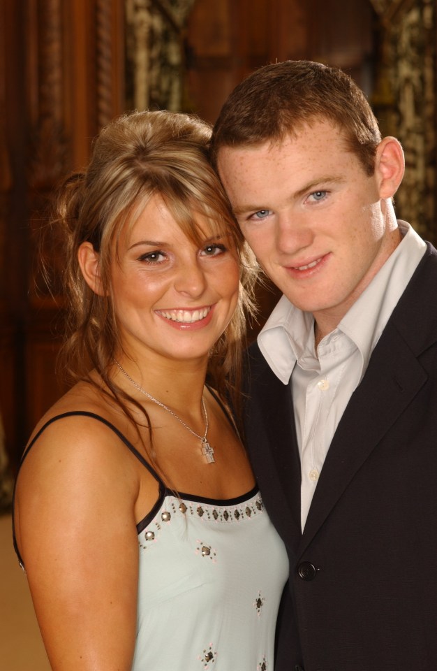 a man and a woman are posing for a picture together