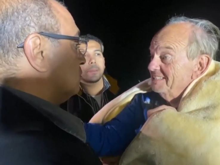 A Belgian man smiled and said "It's nice to be back" after being rescued