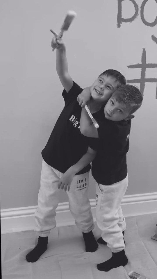 two young boys wearing shirts that say limit less