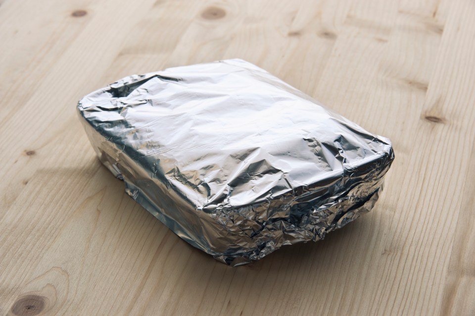 Food scientists are warning against using aluminium foil to wrap leftover food in