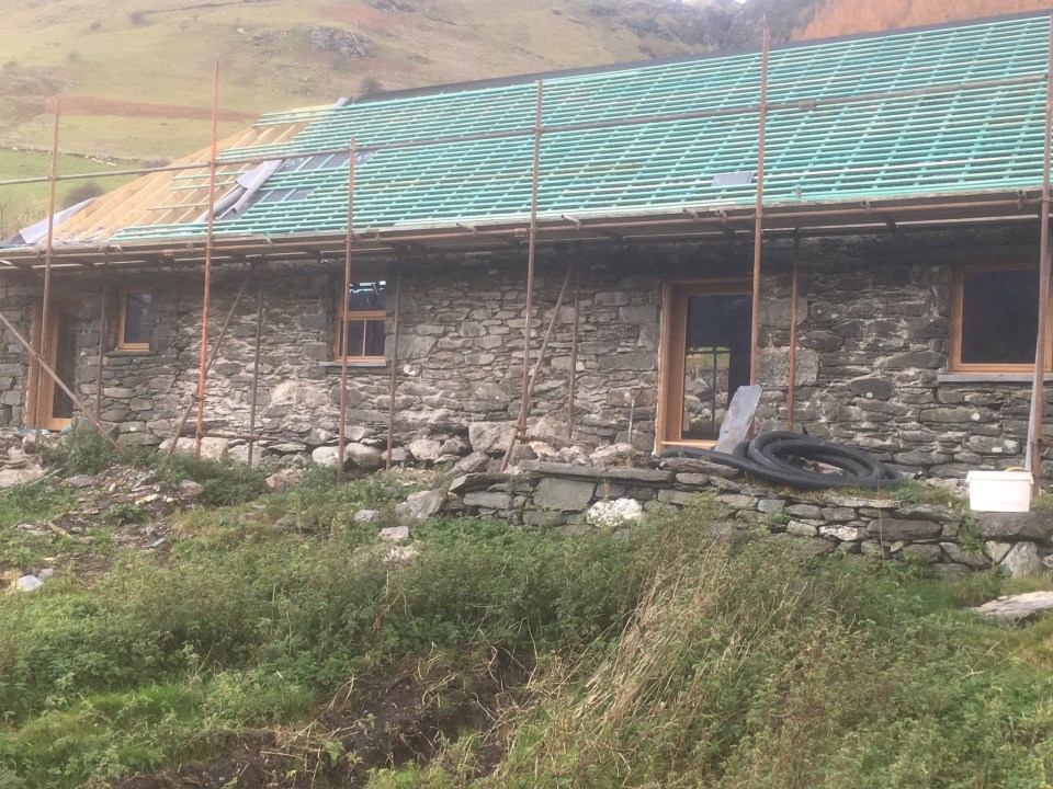 Simon Baker’s derelict Eryri cowshed while being renovated in the Machno Valley in North Wales