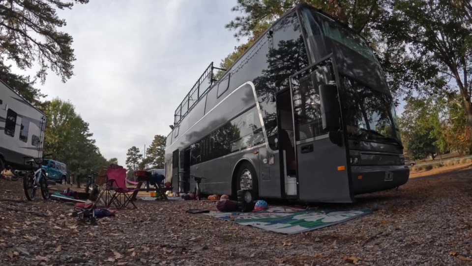 The RV includes two floors and a roof deck to give the family-of-eight maximum space