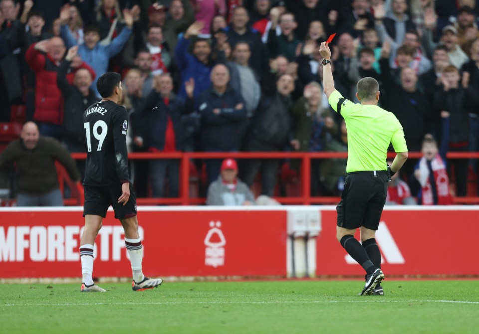 a referee gives a red card to a player wearing number 19