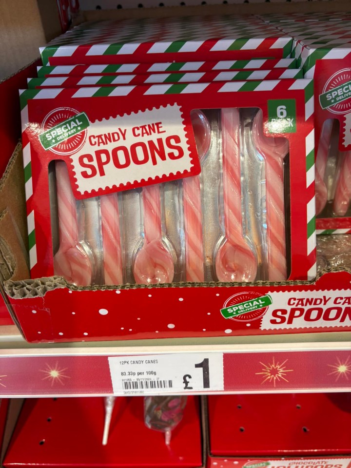 a box of candy cane spoons is on a shelf