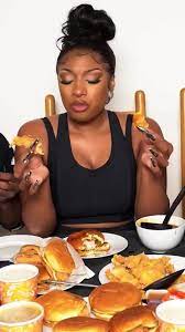 Megan Thee Stallion performing a Mukbang