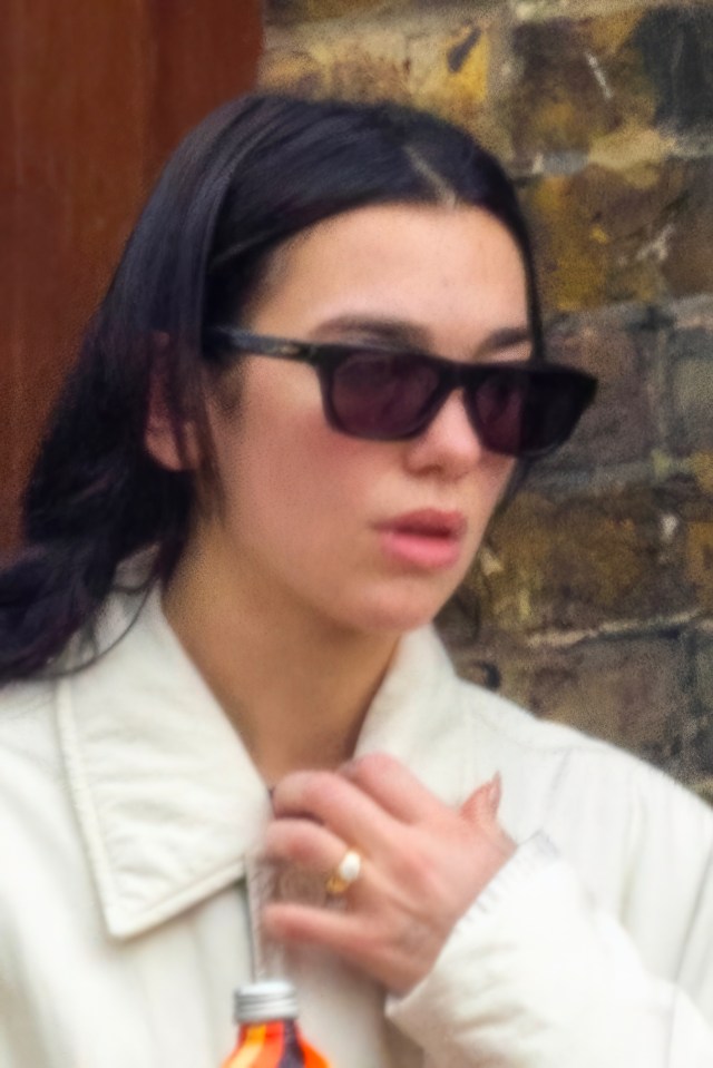 Her huge new engagement ring was visible on her finger