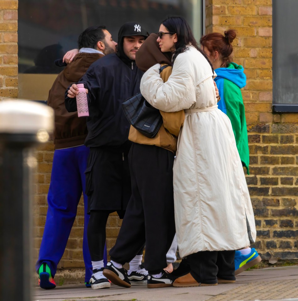 Dua greeted her friends on Chalk Farm Road, London