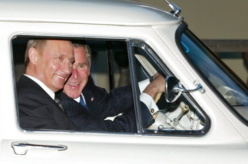 George W. Bush drives Putin's 1956 Volga after their meeting in 2005