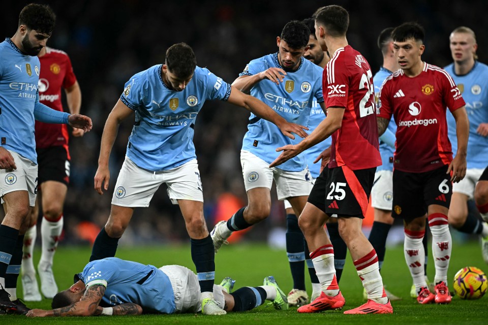 The Man City star dived to the ground after the clash