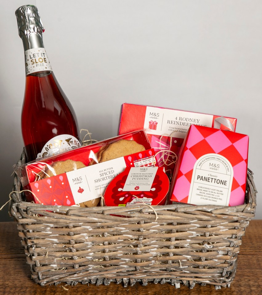 Marks & Spencer Christmas hamper with sloe fizz, shortbread, Christmas pudding, and panettone.