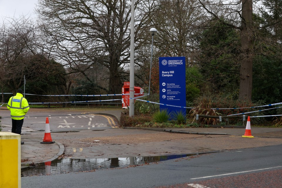 A security officer outside a police cordon on Tuesday