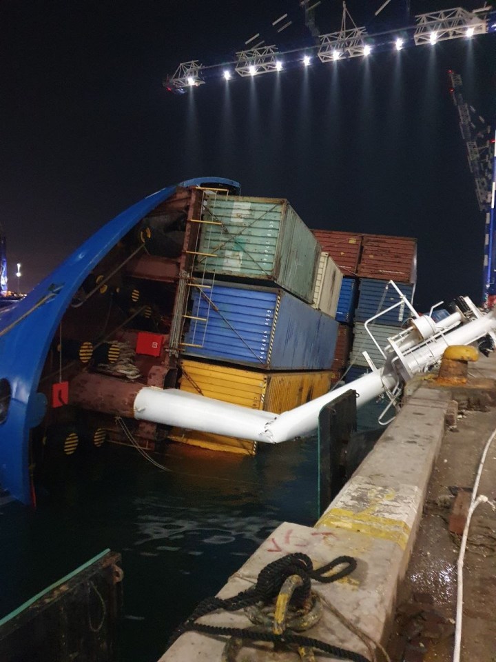 Huge containers also toppled into the water