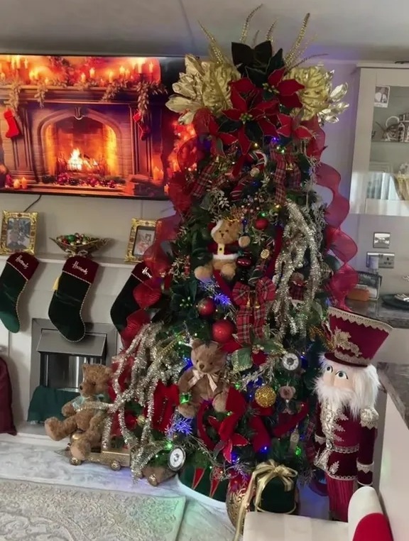 A gypsy showed off her incredible Christmas decorations, including a Harrods-themed tree and stockings