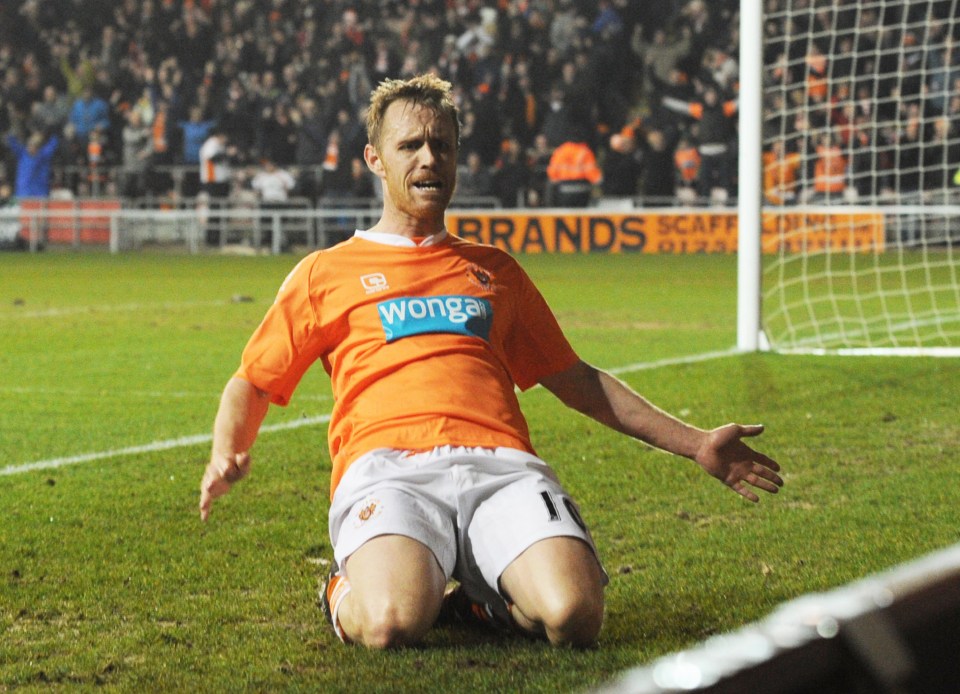 Brett Ormerod celebrates scoring a goal.