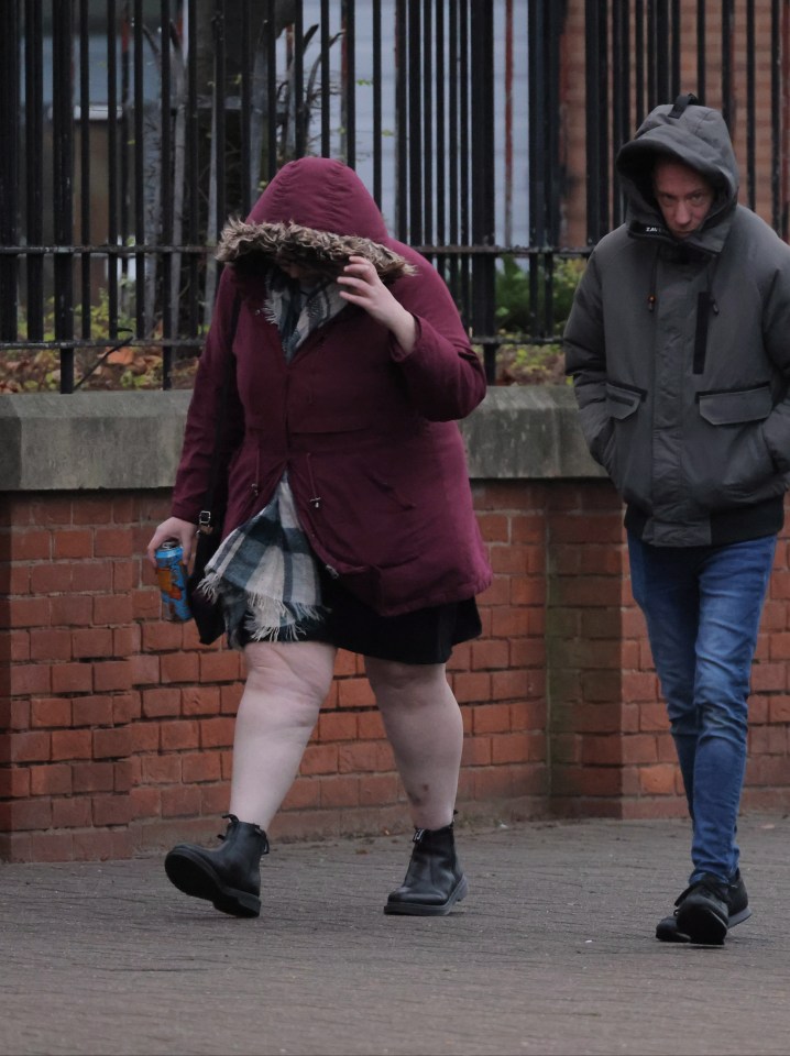 Massey covered her face as she arrived at Teesside Crown Court