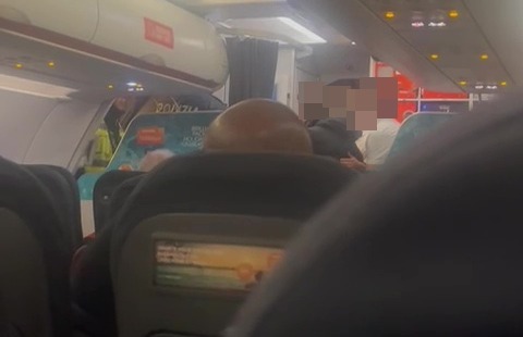 A young female passenger allegedly launched an assault on staff