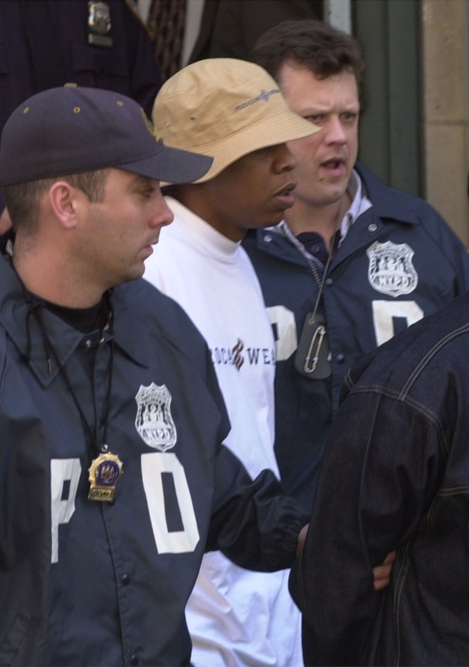 Jay-Z being arrested in 2001 for his part in a stabbing