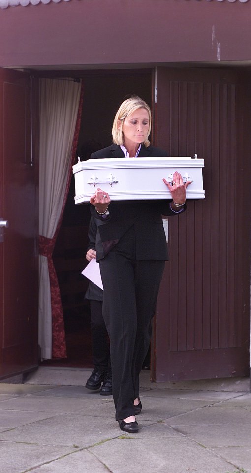 Sergeant Lindsay McNair, who was part of the investigation, carried the tiny white coffin