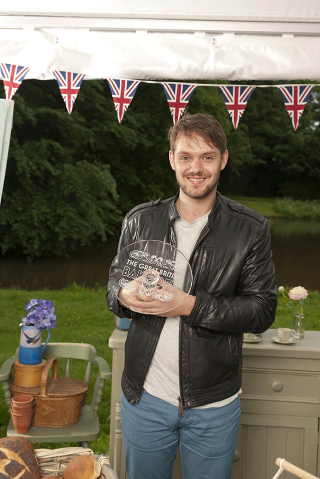 A 23-year old John after winning Great British Bake Off