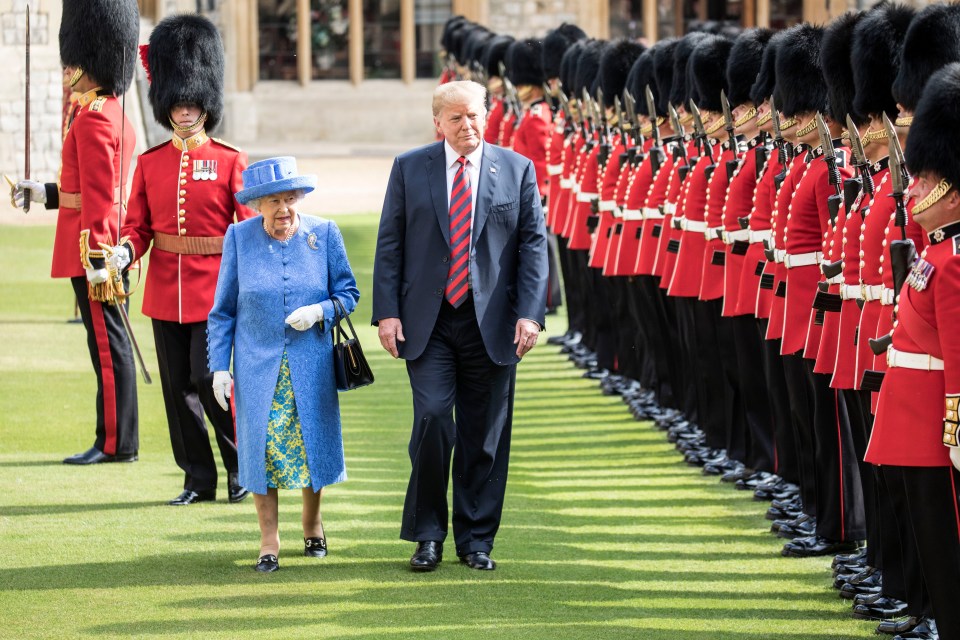 Trump walks alongside Queen Elizabeth II