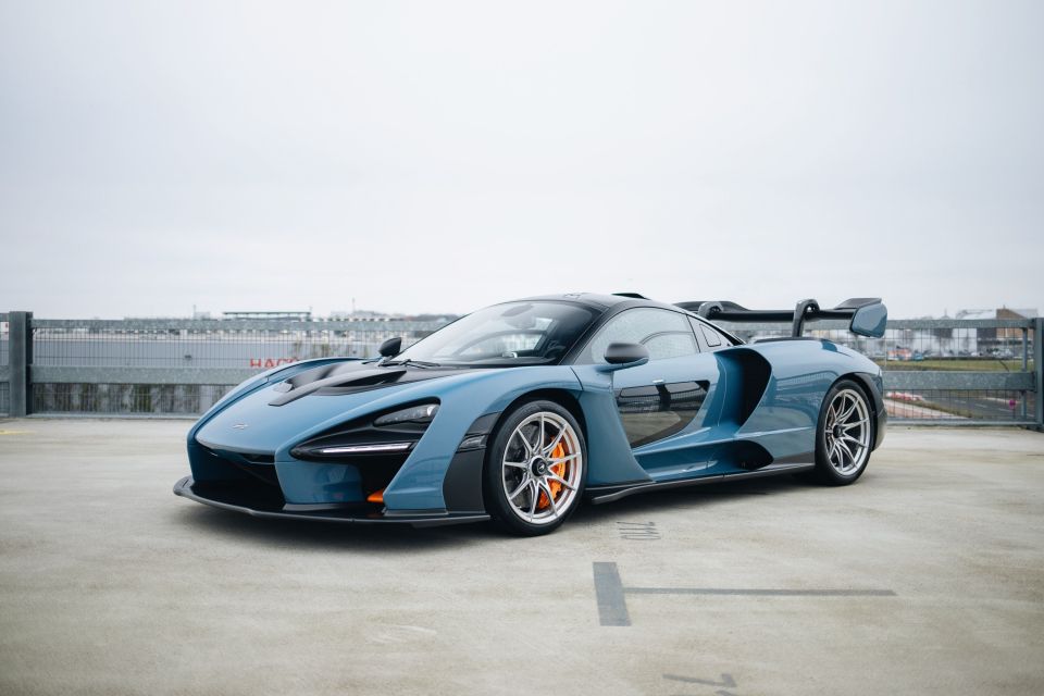 The luxury car comes in Victory Grey with orange accents