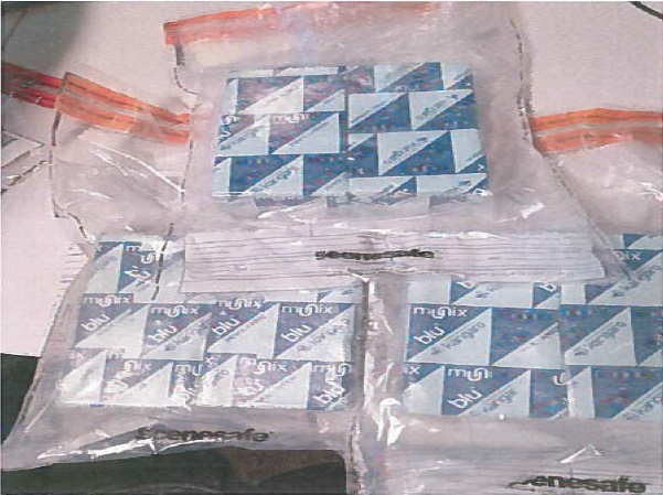 Seized packages of alpha-phenylacetoacetamide.