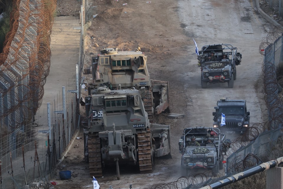 Israeli troops at the border with Syria near the Druze village of Majdal Shams, in the Israeli-annexed Golan Heights, on December 9