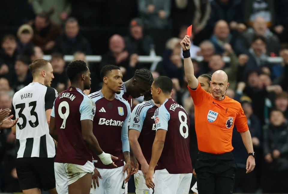 Referee showing Aston Villa's Jhon Duran a red card.