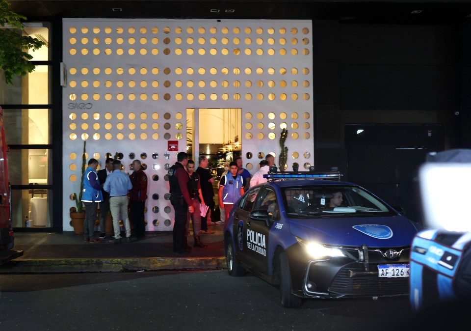 Police at the hotel after the singer's tragic death