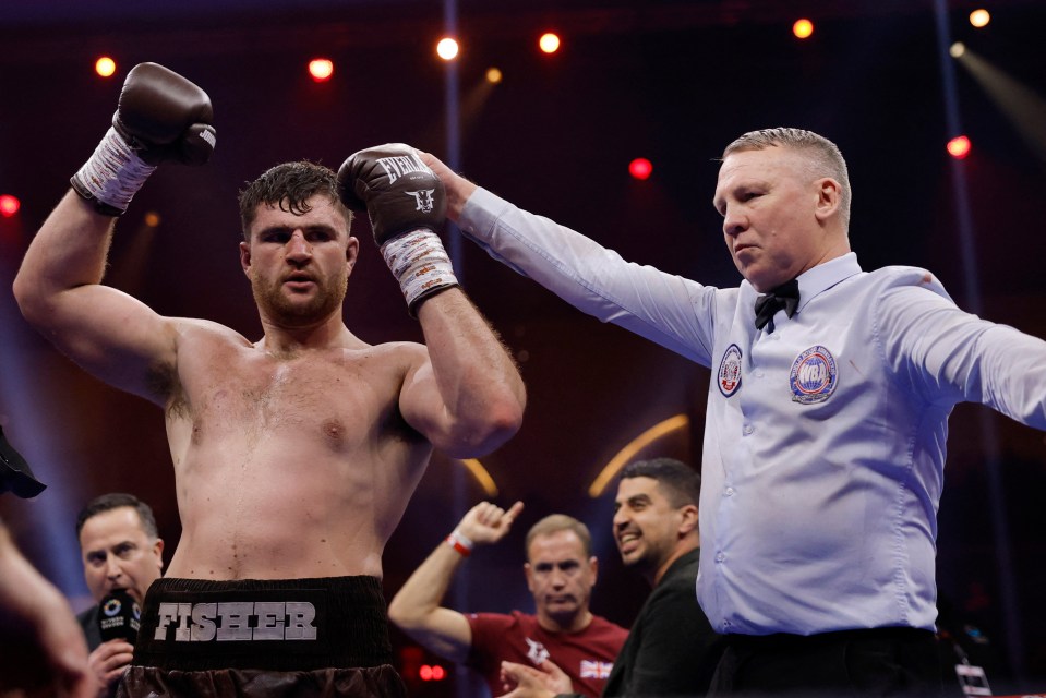 Johnny Fisher celebrates a boxing victory.