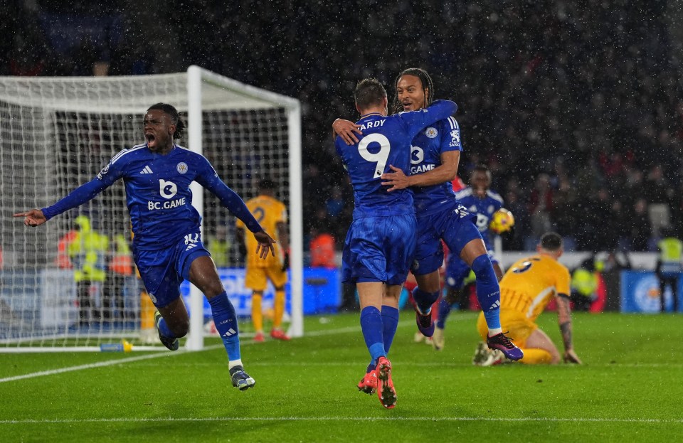 First Foxes scorer Jamie Vardy helps Bobby De-Cordova Reid celebrate a stoppage-time point-saver that the ex-England striker teed up