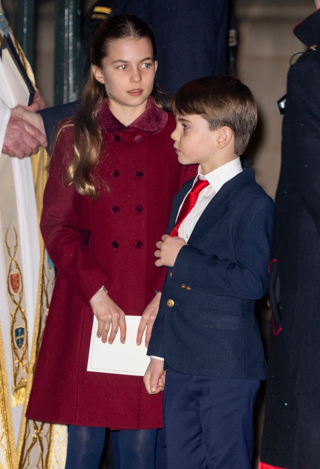 Princess Charlotte was impeccably behaved, but gave a few serious-looking stares