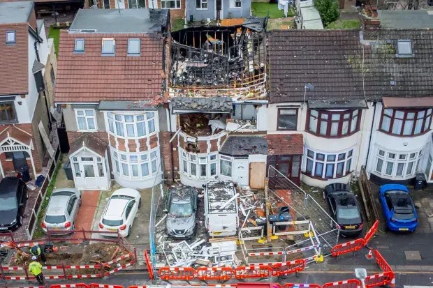 A terrifying explosion tore through a terraced house in Ley Street, Ilford, sending debris flying and engulfing the property in flames