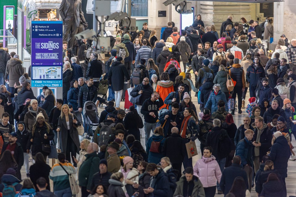 Crowded Waterloo Station in London during the Christmas shopping rush.