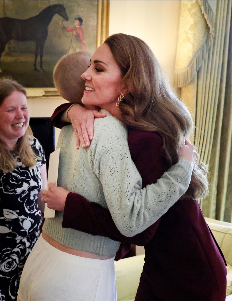 Kate hugging young photographer Liz Hatton