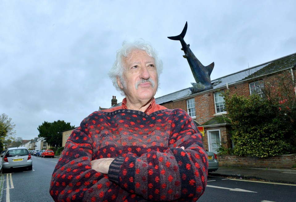 Bill Heine installed a shark on the roof of his house in 1986