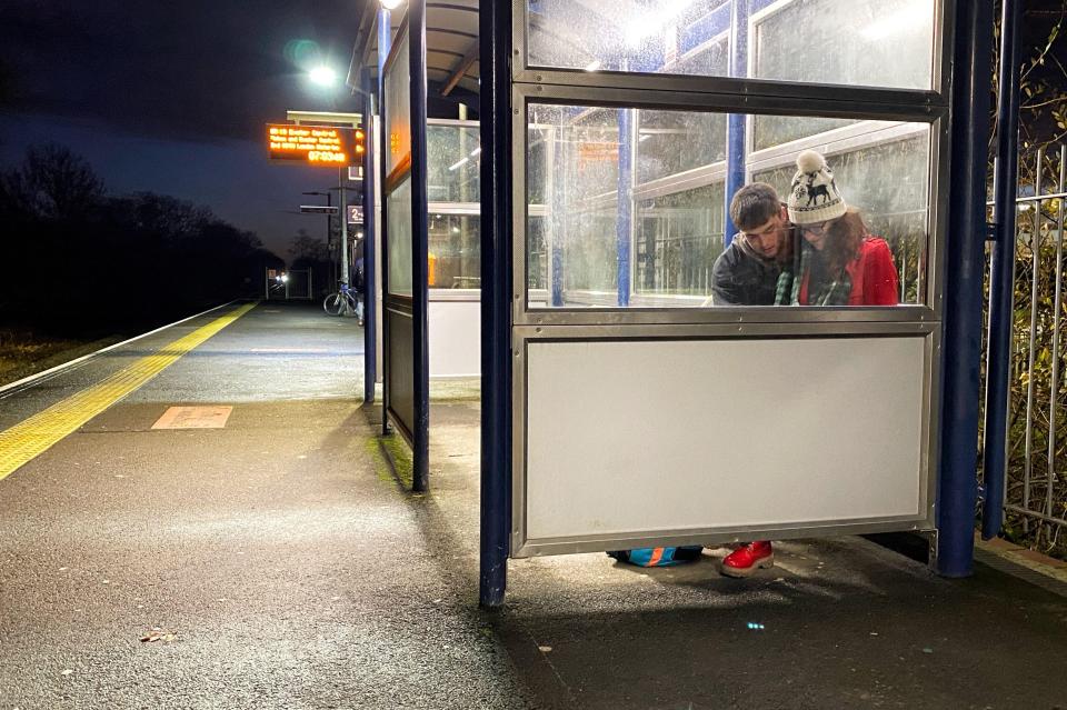 Passengers wait for delayed South Western Railway train at Cranbrook, Devon